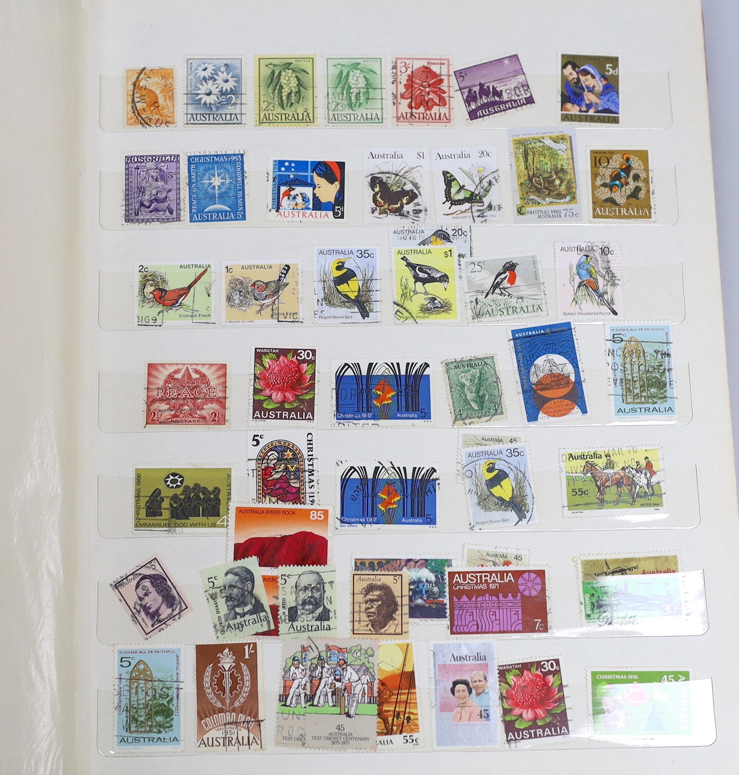 Four albums of World Stamps and a box of first day covers and mint unused stamps